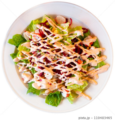 Salad with crab meat, lettuce, corn, beet and pink sauce 110483465