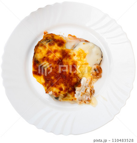 Eggplant stuffed with young cheese baked under egg crust. 110483528