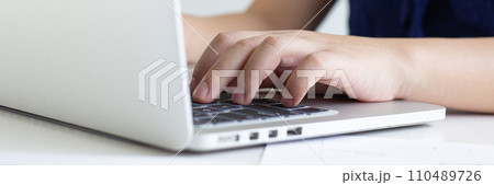 Financial businessmen use laptop to analyze marketing strategies and real estate data to reduce company taxes for their customers, Accounting and Tax concept. 110489726