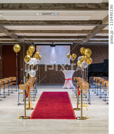 German Abitur Graduation party room decoration and Award sculptures red carpet preparations for surprise party German Abitur Graduation party room decoration and Award sculptures red carpet preparations for surprise party 110490190