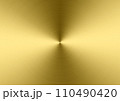 Background of brushed metal gold plate with reflections in circular shape 110490420