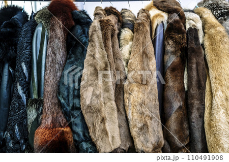 Fur coats on sale at a vintage store. Fashion and clothing. Fur coats on sale at a vintage store. Fashion and clothing. 110491908