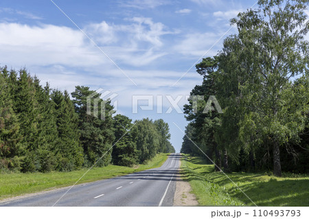 paved road in sunny weather 110493793