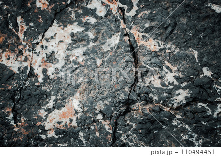 Seaside grey textured rock concept photo. Close up stone background for design. Texture in nature 110494451