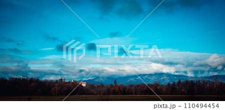 Autumn view of the Pyrenean mountains in Poland concept photo. Beautiful Polish countryside church. 110494454