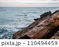 Winter sea with stones on the beach concept photo. Underwater rock. Mediterranean sea. 110494459