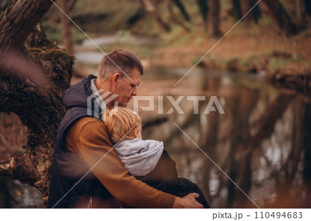 Man and boy tourists autumn time leisure, vacation hiking or traveling touristic activity. 110494683