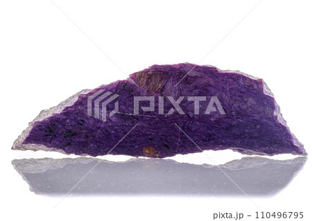 macro mineral stone Charoite on a white background macro mineral stone Charoite on a white background 110496795