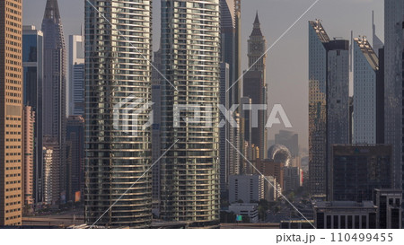 Dubai International Financial district aerial timelapse during sunrise 110499455