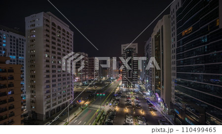 Residential buildings and modern city architecture of Abu Dhabi aerial timelapse during all night, UAE. Residential buildings and modern city architecture of Abu Dhabi aerial timelapse during all night, UAE. 110499465