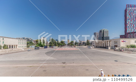 Panorama showing traffic on the Deshmoret e Kombit Boulevard in Tirana timelapse. 110499526