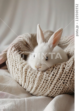 White rabbit peeking out from wicker basket, embodiment of curiosity, ideal for Easter or pet-related content, AI Generated. White rabbit peeking out from wicker basket, embodiment of curiosity, ideal for Easter or pet-related content, AI Generated. 110500352