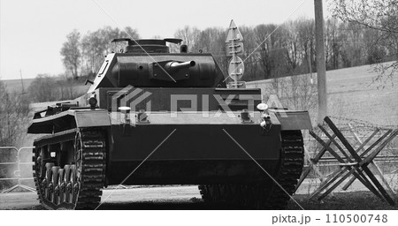 German Wehrmacht Light Panzer Tank Moves Into Position. German Wehrmacht World War Ii Automotive. Armored Combat Tank. Reconstruction Of Battles World War Ii. Black And White German Wehrmacht Light Panzer Tank Moves Into Position. German Wehrmacht World War Ii Automotive. Armored Combat Tank. Reconstruction Of Battles World War Ii. Black And White 110500748