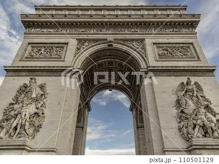 amous Arc de Triomphe (Triumphal Arch) at the city center of Paris. amous Arc de Triomphe (Triumphal Arch) at the city center of Paris. 110501129