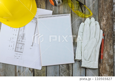 Renovations to home remodeling kitchen with cabinets plan blueprint for architectural engineer to design on table Renovations to home remodeling kitchen with cabinets plan blueprint for architectural engineer to design on table 110503827