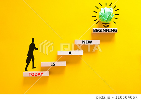 Today is a new beginning symbol. Concept words Today is a new beginning on wooden blocks. Beautiful yellow table yellow background. Businessman icon. Business today new beginning concept. Copy space 110504067
