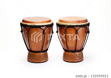Two wooden drums with black straps. Bongo drums isolated on a white background 110504923