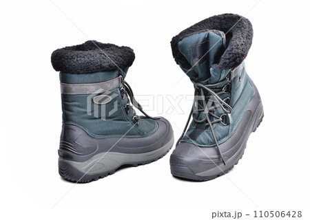 shoes, off-road boots warmed for the cold season, high shin, lacing, anti-slip corrugated reinforced sole for travel and winter fishing isolate on a white background 110506428