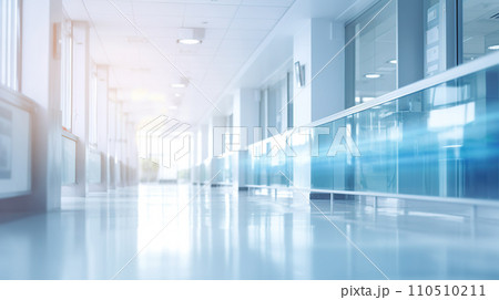 Interior corridor of a modern building. Spacious and bright, glass walls. An empty hospital corridor with bright blue walls and a glossy poured floor. 110510211