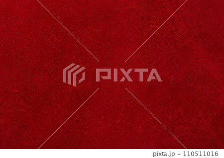 Red suede texture. Natural red dyed leather, suede macro photo. Red suede texture. Natural red dyed leather, suede macro photo. 110511016
