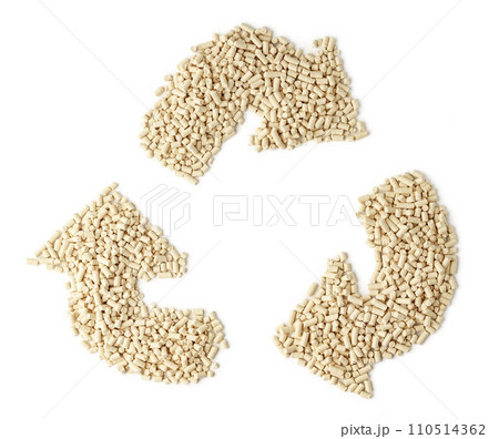 Wooden filler for cat litter box isolated on white background close up 110514362