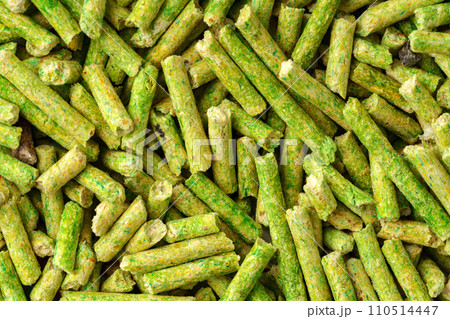 Green filler for cat litter box close up 110514447