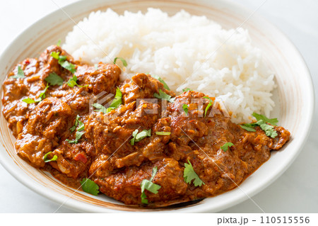 chicken tikka masala with rice on plate chicken tikka masala with rice on plate 110515556