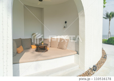 pillows on outdoor patio sofa 110516178