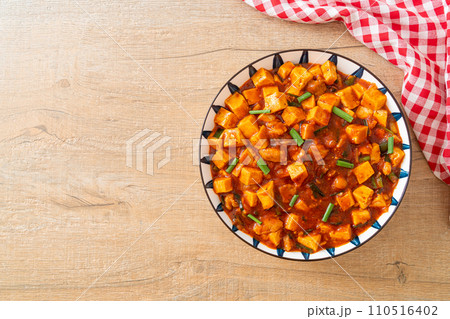 Mapo Tofu - The traditional Sichuan dish of silken tofu and ground beef, packed with mala flavor from chili oil and Sichuan peppercorns. Mapo Tofu - The traditional Sichuan dish of silken tofu and ground beef, packed with mala flavor from chili oil and Sichuan peppercorns. 110516402