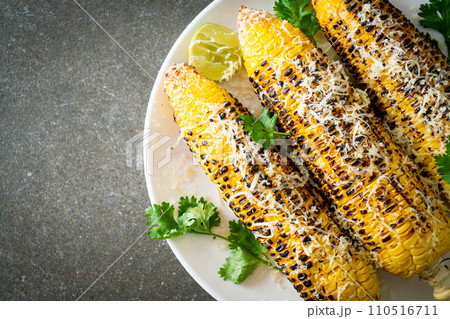barbecue and grilled corn with cheese and lime barbecue and grilled corn with cheese and lime 110516711