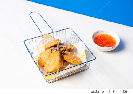 fried chicken wings with sauce fried chicken wings with sauce 110516860