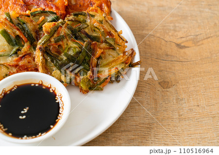 Pajeon or Korean pancake and Korean Kimchi pancake or Kimchijeon on white background 110516964
