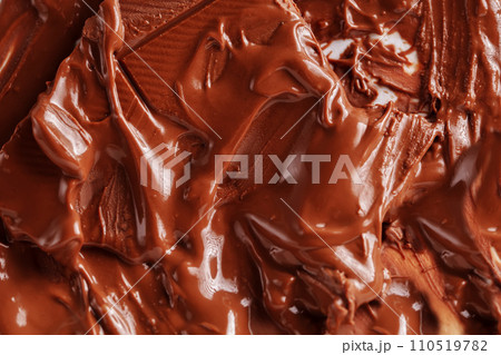 Sweet melted chocolate background. Mass of chocolate. Sweet melted chocolate background. Mass of chocolate. 110519782