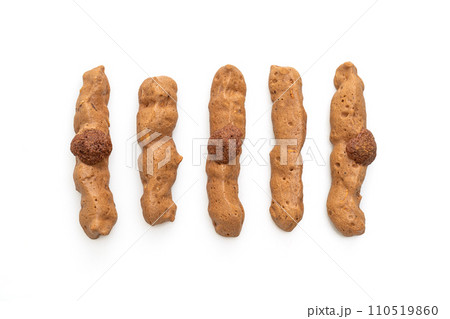 chocolate meringue stick on white background 110519860