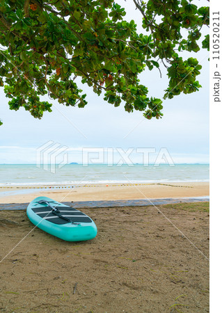 paddle board on beach with sea background paddle board on beach with sea background 110520211