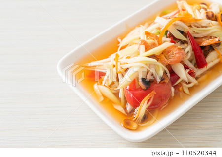 Som Tum - Spicy papaya salad Som Tum - Spicy papaya salad 110520344