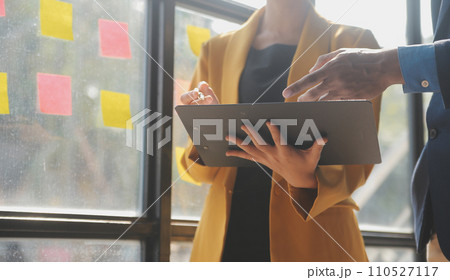 Close up of Business team analyzing income charts and graphs with modern laptop computer. Business analysis and strategy concept. 110527117