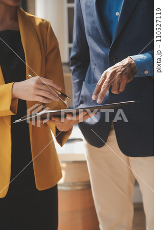 Close up of Business team analyzing income charts and graphs with modern laptop computer. Business analysis and strategy concept. 110527119