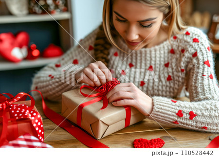 AI-generated content. Heartfelt Packaging: Woman Tying Red Ribbon on Valentine's Present AI-generated content. Heartfelt Packaging: Woman Tying Red Ribbon on Valentine's Present 110528442