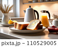 Sliced bread with butter and jam on a plate next to a kettle and jug in bright sunny kitchen, early morning, kitchen table, good start of day. AI 110529005