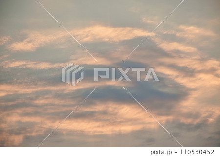 cloud spreading on twilight sunset sky in evening  110530452