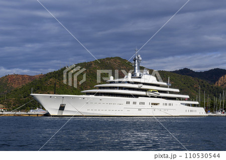 Luxury super yacht moored alongside in marina. Motor yacht. Large mega yacht. Yachting concept. 110530544