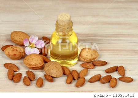Organic almond oil in a bottle Organic almond oil in a bottle 110531413