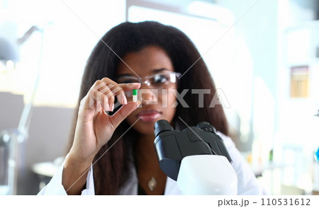 Female medicine doctor hand hold jar of pills Female medicine doctor hand hold jar of pills 110531612