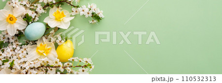 Spring flowers and Easter eggs 110532313