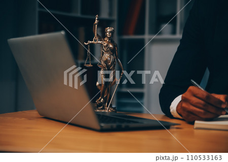 Judge gavel with Justice lawyers having team meeting at law firm background. Concepts of Law and Legal services. Judge gavel with Justice lawyers having team meeting at law firm background. Concepts of Law and Legal services. 110533163