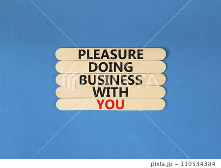 Pleasure doing business with you symbol. Concept words Pleasure doing business with you on wooden stick. Beautiful blue table blue background. Pleasure doing business with you concept. Copy space. 110534384