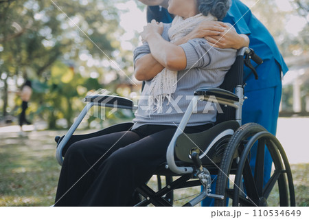 Young asian caretaker with 60s asia elderly woman consulting and encourage, take a history and recommend the right treatment to live happily in retirement, holding hands and encouraging Young asian caretaker with 60s asia elderly woman consulting and encourage, take a history and recommend the right treatment to live happily in retirement, holding hands and encouraging 110534649