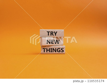 Try new Things symbol. Concept words Try new Things on wooden blocks. Beautiful orange background. Business and Try new Things concept. Copy space. Try new Things symbol. Concept words Try new Things on wooden blocks. Beautiful orange background. Business and Try new Things concept. Copy space. 110535174