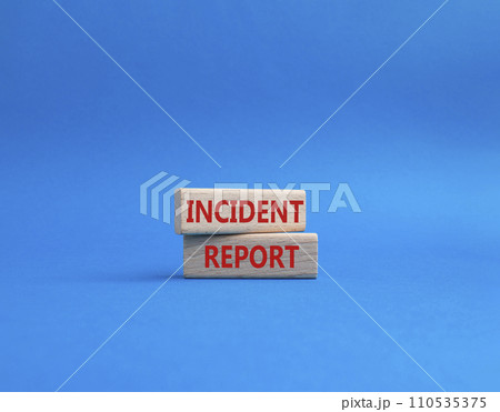 Incident Report symbol. Concept word Incident Report on wooden blocks. Beautiful blue background. Business and Incident Report concept. Copy space 110535375